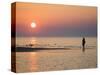 Girl Walking Barefoot on Beach at Sunset, Jurmala Beach Resort, Gulf of Riga, Latvia-Christian Kober-Stretched Canvas