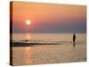 Girl Walking Barefoot on Beach at Sunset, Jurmala Beach Resort, Gulf of Riga, Latvia-Christian Kober-Stretched Canvas