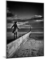 Girl Walking on Sea Defence-Rory Garforth-Mounted Photographic Print