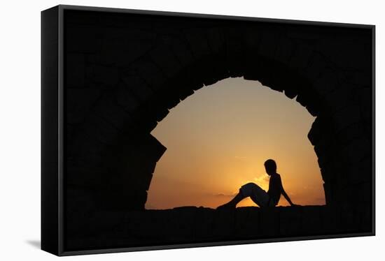 Girl watching sunset in Cesarea-Godong-Framed Stretched Canvas