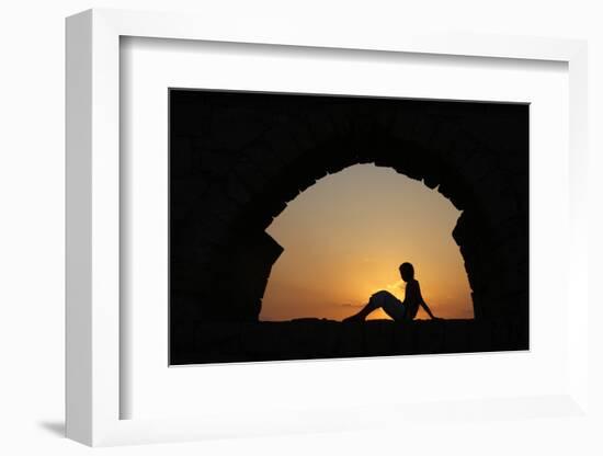 Girl watching sunset in Cesarea-Godong-Framed Photographic Print