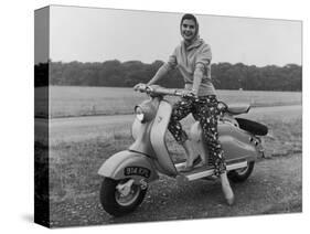 Girl Wearing a Headscarf and Jazzy Slacks Models a Lambretta Ld 125 Mark IV Scooter-null-Stretched Canvas