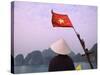 Girl with Conical Hat on a Junk Boat with National Flag and Karst Islands in Halong Bay, Vietnam-Keren Su-Stretched Canvas