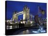 Girl with Dolphin by David Wynne, Illuminated at Night in Front of Tower Bridge, London, England-Peter Barritt-Stretched Canvas