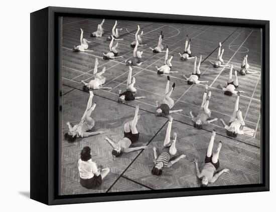 Girls and Women Doing Leg Exercise on Floor of Metropolitan Life Insurance Company's Gym-Herbert Gehr-Framed Stretched Canvas
