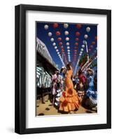 Girls Dancing a Sevillana Beneath Colourful Lanterns, Feria De Abril, Seville, Andalucia, Spain-Ruth Tomlinson-Framed Premium Photographic Print