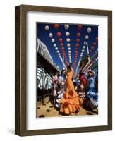 Girls Dancing a Sevillana Beneath Colourful Lanterns, Feria De Abril, Seville, Andalucia, Spain-Ruth Tomlinson-Framed Photographic Print