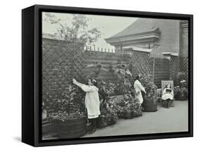 Girls Gardening and Reading in a Roof Top Garden, White Lion Street School, London, 1912-null-Framed Stretched Canvas