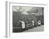 Girls Gardening and Reading in a Roof Top Garden, White Lion Street School, London, 1912-null-Framed Premium Photographic Print