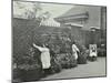 Girls Gardening and Reading in a Roof Top Garden, White Lion Street School, London, 1912-null-Mounted Premium Photographic Print