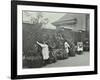 Girls Gardening and Reading in a Roof Top Garden, White Lion Street School, London, 1912-null-Framed Premium Photographic Print