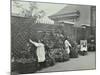 Girls Gardening and Reading in a Roof Top Garden, White Lion Street School, London, 1912-null-Mounted Premium Photographic Print