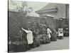 Girls Gardening and Reading in a Roof Top Garden, White Lion Street School, London, 1912-null-Stretched Canvas