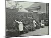 Girls Gardening and Reading in a Roof Top Garden, White Lion Street School, London, 1912-null-Mounted Photographic Print