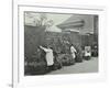 Girls Gardening and Reading in a Roof Top Garden, White Lion Street School, London, 1912-null-Framed Photographic Print