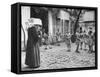 Girls Gathering in the Courtyard of the Mission, Nuns Nearby-null-Framed Stretched Canvas