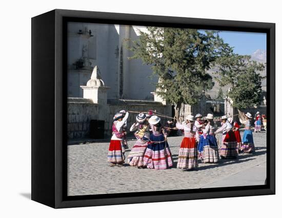 Girls in Traditional Local Dress Dancing in Square at Yanque Village, Colca Canyon, Peru-Tony Waltham-Framed Stretched Canvas