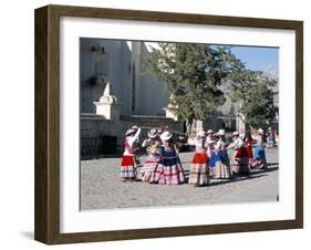 Girls in Traditional Local Dress Dancing in Square at Yanque Village, Colca Canyon, Peru-Tony Waltham-Framed Photographic Print