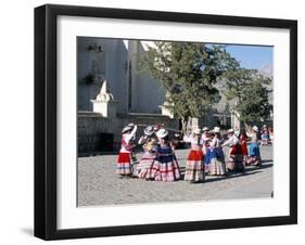 Girls in Traditional Local Dress Dancing in Square at Yanque Village, Colca Canyon, Peru-Tony Waltham-Framed Photographic Print