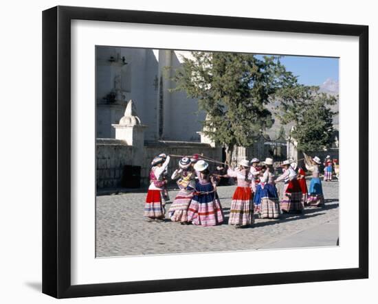 Girls in Traditional Local Dress Dancing in Square at Yanque Village, Colca Canyon, Peru-Tony Waltham-Framed Photographic Print