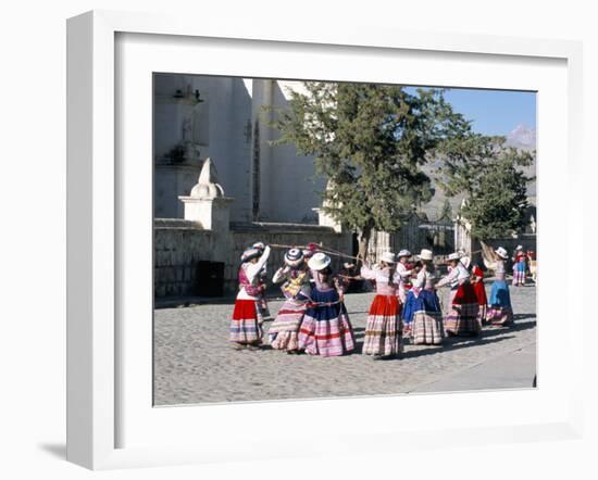 Girls in Traditional Local Dress Dancing in Square at Yanque Village, Colca Canyon, Peru-Tony Waltham-Framed Photographic Print