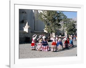 Girls in Traditional Local Dress Dancing in Square at Yanque Village, Colca Canyon, Peru-Tony Waltham-Framed Photographic Print