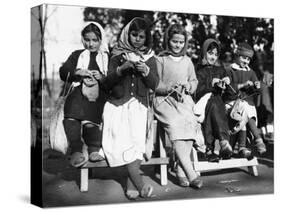 Girls Knitting in Albania Photograph - Albania-Lantern Press-Stretched Canvas