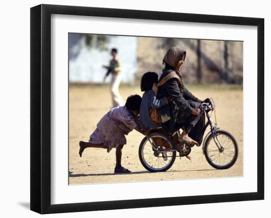 Girls Play on a Bike in Jammu, India-null-Framed Photographic Print