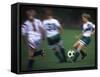Girls Playing Soccer on a Field-null-Framed Stretched Canvas