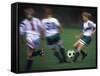Girls Playing Soccer on a Field-null-Framed Stretched Canvas