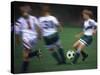 Girls Playing Soccer on a Field-null-Stretched Canvas