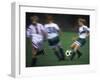 Girls Playing Soccer on a Field-null-Framed Premium Photographic Print