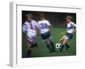 Girls Playing Soccer on a Field-null-Framed Photographic Print