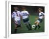 Girls Playing Soccer on a Field-null-Framed Photographic Print