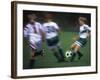 Girls Playing Soccer on a Field-null-Framed Photographic Print