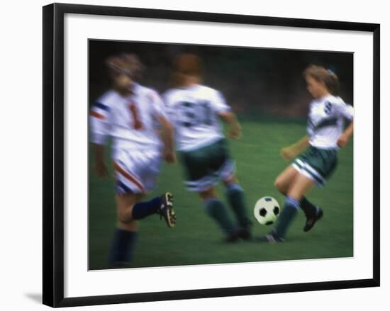 Girls Playing Soccer on a Field-null-Framed Photographic Print