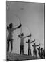 Girls Practicing Archery-null-Mounted Photographic Print
