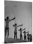 Girls Practicing Archery-null-Mounted Photographic Print