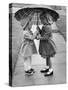 Girls Sharing an Umbrella-Josef Scaylea-Stretched Canvas
