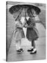 Girls Sharing an Umbrella-Josef Scaylea-Stretched Canvas