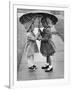 Girls Sharing an Umbrella-Josef Scaylea-Framed Photographic Print