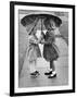 Girls Sharing an Umbrella-Josef Scaylea-Framed Photographic Print