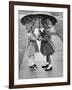 Girls Sharing an Umbrella-Josef Scaylea-Framed Photographic Print