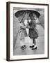 Girls Sharing an Umbrella-Josef Scaylea-Framed Photographic Print