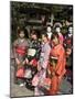 Girls Wearing Yukata, Kimono, Geisha, Maiko (Trainee Geisha) in Gion, Kyoto City, Honshu, Japan-Christian Kober-Mounted Photographic Print