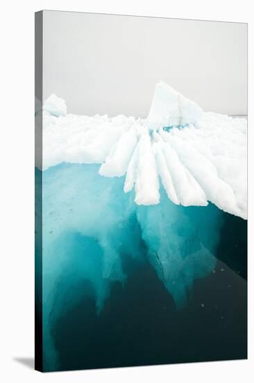 Glacial Iceberg Floating Along Coast, Spitsbergen, Svalbard, Norway-Steve Kazlowski-Stretched Canvas