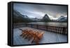 Glacier, Montana: Chairs Line the Deck of the Many Glacier Lodge During Sunset-Brad Beck-Framed Stretched Canvas