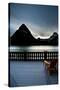 Glacier, Montana: Chairs Line the Deck of the Many Glacier Lodge During Sunset-Brad Beck-Stretched Canvas