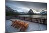 Glacier, Montana: Chairs Line the Deck of the Many Glacier Lodge During Sunset-Brad Beck-Mounted Photographic Print