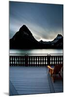 Glacier, Montana: Chairs Line the Deck of the Many Glacier Lodge During Sunset-Brad Beck-Mounted Photographic Print